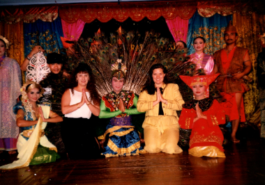 Kelly, in yellow, participating in a Malaysian cultural night